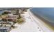 Aerial view of a beach with ocean front property and hotels nearby at 281 44Th Ave, St Pete Beach, FL 33706