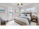 Stylishly furnished bedroom featuring calming decor, a cozy bed, and ample natural light at 281 44Th Ave, St Pete Beach, FL 33706