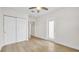 This bedroom features wood floors and a closet for storage solutions at 281 44Th Ave, St Pete Beach, FL 33706
