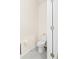 Compact half bathroom with toilet and modern fixtures at 2906 Boxwood Grove Row, Wesley Chapel, FL 33543