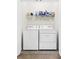 Convenient laundry room featuring a side-by-side washer and dryer for easy laundry days at 2906 Boxwood Grove Row, Wesley Chapel, FL 33543