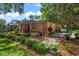 Charming home with brick exterior, manicured landscaping, and a welcoming walkway at 2963 Cielo N Cir, Clearwater, FL 33759