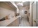 Laundry room with sink, cabinetry, and a desk area at 2963 Cielo N Cir, Clearwater, FL 33759