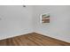 This bedroom is ready for decor, featuring luxury vinyl plank flooring and a bright window at 3151 6Th S Ave, St Petersburg, FL 33712