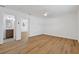 Bedroom with hardwood floors and ceiling fan that leads to the bathroom at 3151 6Th S Ave, St Petersburg, FL 33712