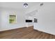 Bright dining room space with a window and views into the modern kitchen at 3151 6Th S Ave, St Petersburg, FL 33712