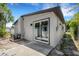 The house exterior features a sliding glass door that connects to a patio, providing easy outdoor access at 3151 6Th S Ave, St Petersburg, FL 33712