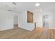 Bright living room featuring a wet bar with a wine cooler and wood-look flooring at 3151 6Th S Ave, St Petersburg, FL 33712