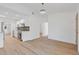 Bright and airy living room with seamless access to the modern kitchen and sleek flooring at 3151 6Th S Ave, St Petersburg, FL 33712