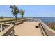 Spacious dock with bench seating area offering scenic views of the bay at 322 Windrush Loop # 22, Tarpon Springs, FL 34689
