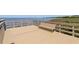 Dock with wooden bench seating area overlooks calm waters at 322 Windrush Loop # 22, Tarpon Springs, FL 34689