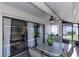 Outdoor patio with a ceiling fan and furniture, perfect for relaxing and enjoying the fresh air at 322 Windrush Loop # 22, Tarpon Springs, FL 34689