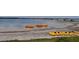 Scenic waterfront view with kayaks and paddleboats available for resident activities and recreation at 322 Windrush Loop # 22, Tarpon Springs, FL 34689