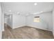 Spacious bedroom featuring hardwood floors, a ceiling fan and lots of natural light at 3910 W Iowa Ave, Tampa, FL 33616