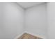 Empty walk-in closet with tile flooring and ample space for storage at 3910 W Iowa Ave, Tampa, FL 33616