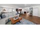 Open-concept living area with a view into the kitchen and dining area at 4103 W Bay Villa Ave, Tampa, FL 33611