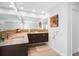 Bathroom boasts a double vanity with a large mirror, offering plenty of counter space at 4138 Saltwater Blvd, Tampa, FL 33615