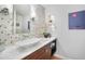 The elegant powder room features a unique vessel sink, mosaic tile accent wall, and stylish fixtures at 4138 Saltwater Blvd, Tampa, FL 33615