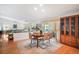 Bright dining area leads to the pool, and is adjacent to the open-concept living area at 4138 Saltwater Blvd, Tampa, FL 33615