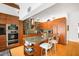 Well-appointed kitchen with custom cabinets, modern appliances, granite countertops, and a functional island at 4138 Saltwater Blvd, Tampa, FL 33615