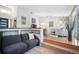 The split-level living room boasts hardwood floors, a ceiling fan, and access to the living room, perfect for relaxing or entertaining at 4138 Saltwater Blvd, Tampa, FL 33615