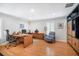 This home office boasts hardwood floors, plantation shutters, and custom built-ins with ample storage space at 4138 Saltwater Blvd, Tampa, FL 33615