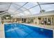 Enjoy the Florida sunshine in this beautiful screened-in pool and patio area at 4138 Saltwater Blvd, Tampa, FL 33615