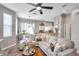 Bright and spacious living room with dining area, comfortable seating, and modern decor at 456 Bayou Village Dr, Tarpon Springs, FL 34689