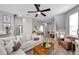 Spacious living room showcasing comfortable seating, modern decor, and an open floor plan at 456 Bayou Village Dr, Tarpon Springs, FL 34689