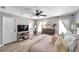 Comfortable main bedroom with decorative details, wooden furniture, and a calming ambiance at 456 Bayou Village Dr, Tarpon Springs, FL 34689