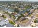 Expansive aerial view of a charming waterfront community with lush landscaping and easy access to beautiful canals at 4643 Bay Crest Dr, Tampa, FL 33615