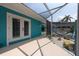 The outdoor living space features a hammock area, connecting screened-in porch with the home's patio, and great yard at 4643 Bay Crest Dr, Tampa, FL 33615