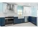 Stylish kitchen featuring shaker cabinets, stainless steel appliances, and bright natural light at 4643 Bay Crest Dr, Tampa, FL 33615