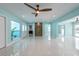 Bright, open living area with access to the backyard and modern finishes at 4643 Bay Crest Dr, Tampa, FL 33615