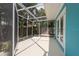 Enjoy outdoor living on this screened lanai with nice views of the landscaped backyard and room for seating at 4643 Bay Crest Dr, Tampa, FL 33615