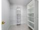 Walk-in closet with shelving and plenty of storage space at 4643 Bay Crest Dr, Tampa, FL 33615