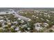 Scenic view of a waterfront community with lush greenery, winding waterways, and serene atmosphere at 608 Betmor Ln, Palm Harbor, FL 34683