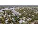 Picturesque waterfront community with lush foliage, calm waters, and attractive residential properties at 608 Betmor Ln, Palm Harbor, FL 34683