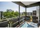 The screened balcony offers relaxing seating and a beautiful view of the surrounding landscape at 6190 80Th N St # 411, St Petersburg, FL 33709