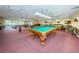 Recreation room with multiple billiard tables, carpet, and ceiling fans at 6190 80Th N St # 411, St Petersburg, FL 33709
