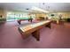 Recreation room featuring multiple billiard tables and shuffleboard at 6190 80Th N St # 411, St Petersburg, FL 33709
