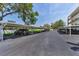 Abundant covered parking is available for residents in this community with mature trees and landscaping at 6190 80Th N St # 411, St Petersburg, FL 33709