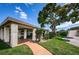 Covered picnic area and barbecue grill surrounded by lush landscaping at 6190 80Th N St # 411, St Petersburg, FL 33709