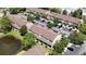 Scenic aerial view of the condo community featuring meticulously kept landscaping and serene water features at 6231 Bayside Key Dr, Tampa, FL 33615