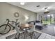 Cozy living room with dining area, contemporary furniture, and sliding glass doors at 6231 Bayside Key Dr, Tampa, FL 33615