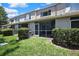 A view of a screened patio offering outdoor living space and backyard area at 6231 Bayside Key Dr, Tampa, FL 33615