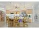 Kitchen boasts an island with seating, stainless appliances, and custom cabinets at 7206 River Country Dr, Weeki Wachee, FL 34607