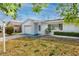 A charming home exterior is enhanced by mature landscaping, manicured flower beds, and an attached garage at 7777 117Th St, Seminole, FL 33772