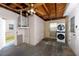 Spacious laundry room with washer, dryer, and access to the outdoors at 7777 117Th St, Seminole, FL 33772