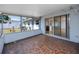 Enclosed patio with tiled floor that is perfect for enjoying outdoor living and entertaining at 7777 117Th St, Seminole, FL 33772